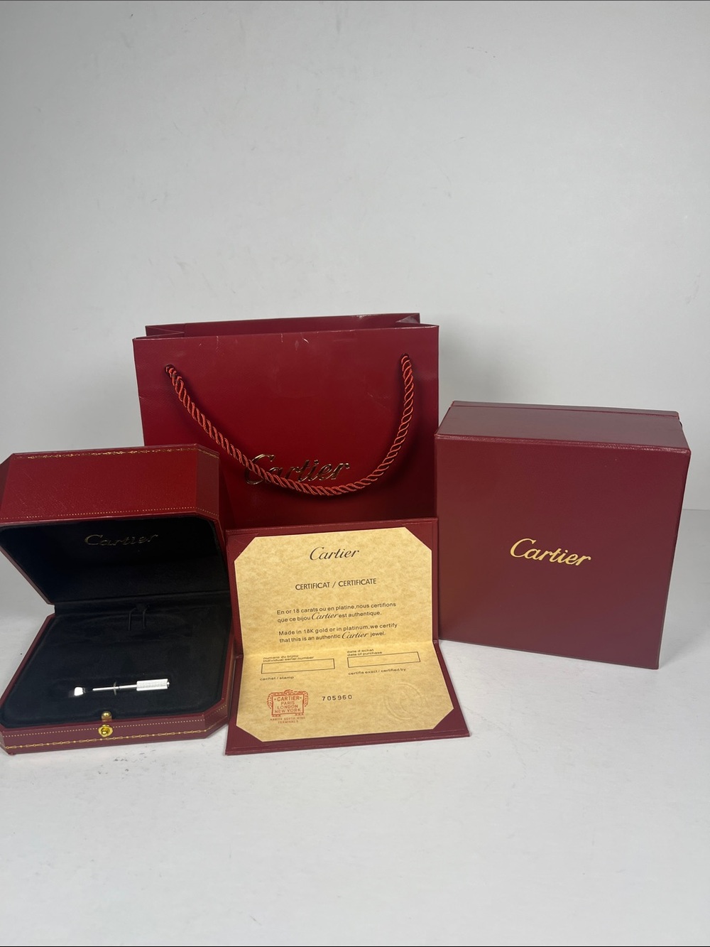 Cartier Burgundy and Gold Presentation Set with Certificate Folder